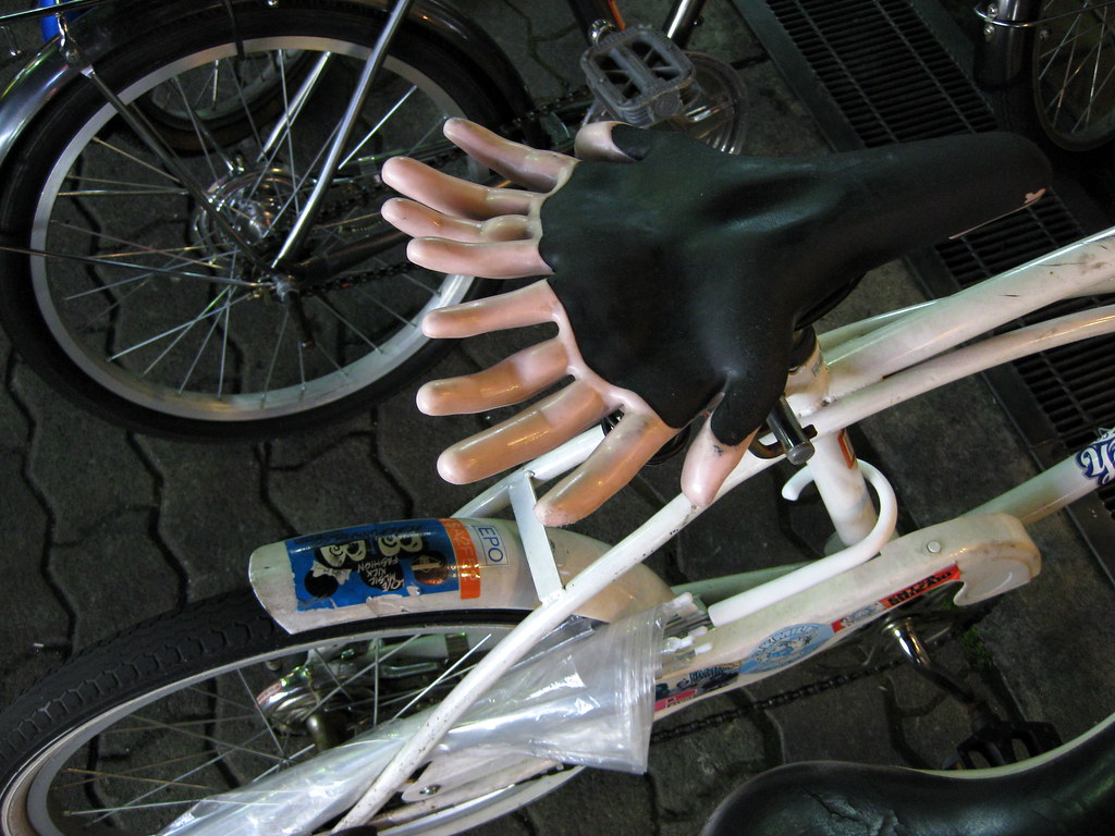 hands on bike seat